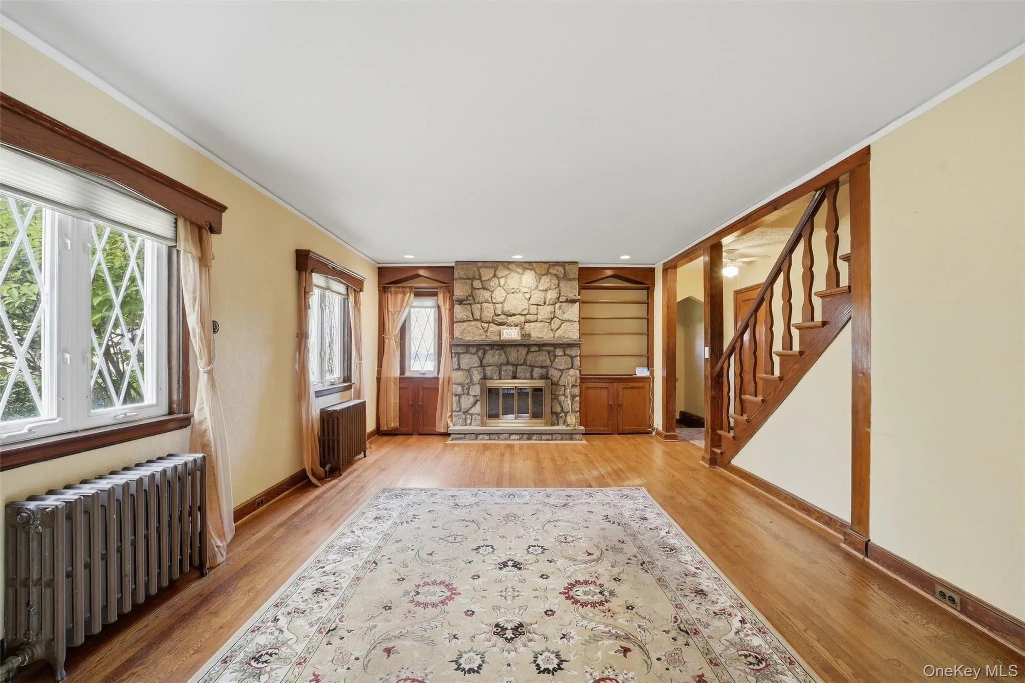 Living Room with Stone Fireplace Living Room with Stone Fireplace