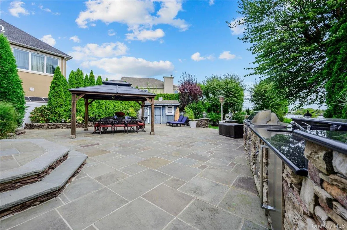 Rear Large Patio w/ Outdoor Kitchen & Pavilion Rear Large Patio w/ Outdoor Kitchen & Pavilion