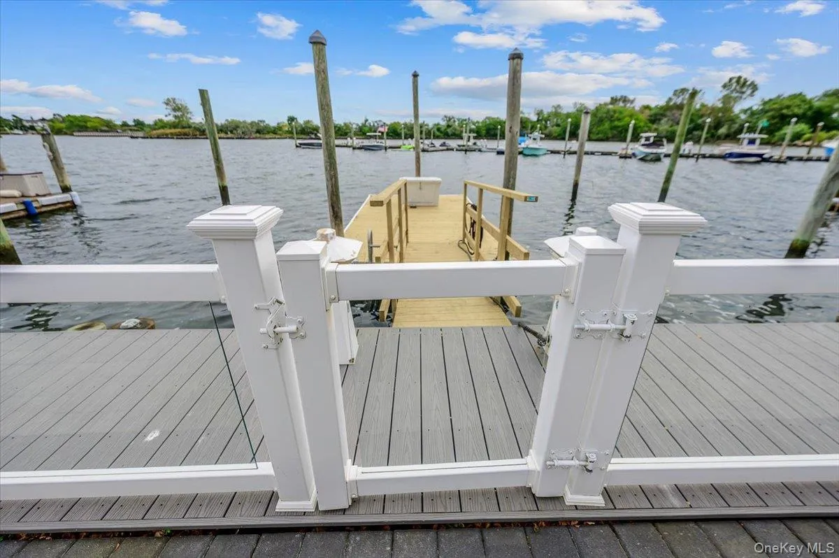 Deck w/ clear fence and new dock. Space for 2 boats Deck w/ clear fence and new dock. Space for 2 boats