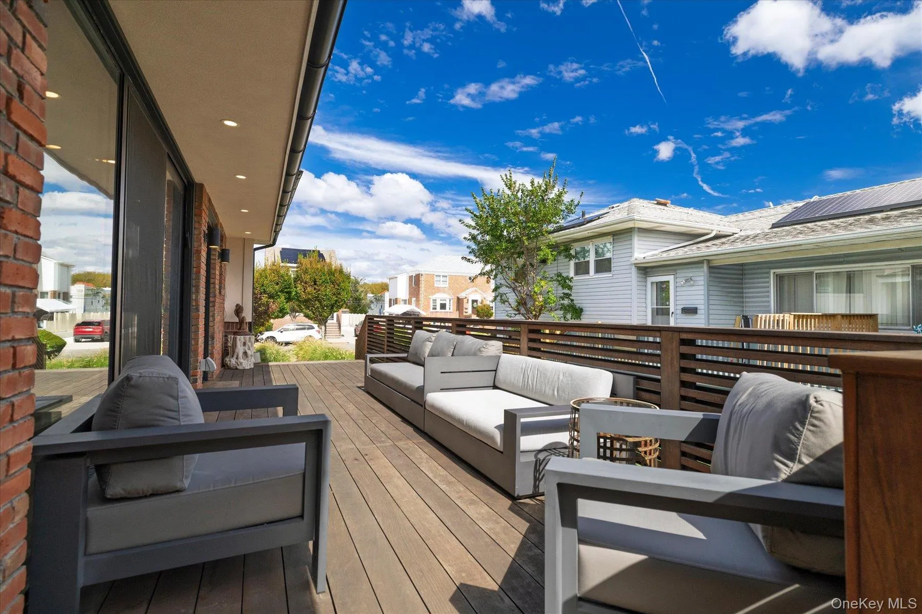 Large outdoor deck for lounging and entertaining Large outdoor deck for lounging and entertaining