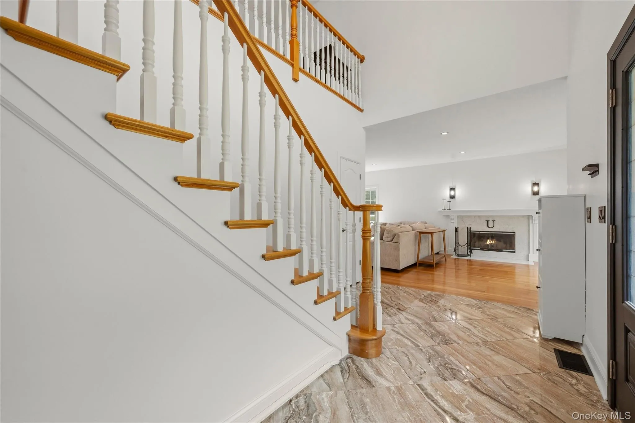 Grand two story foyer with overlook. Grand two story foyer with overlook.