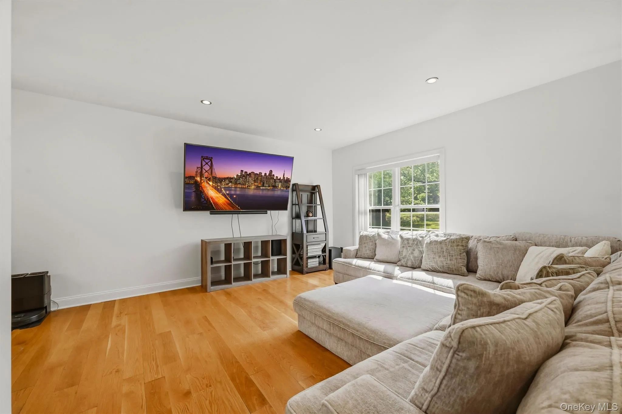 Family room, Anderson windows, 9 foot ceilings, recessed lighting, and wide plank white oak flooring. Family room, Anderson windows, 9 foot ceilings, recessed lighting, and wide plank white oak flooring.