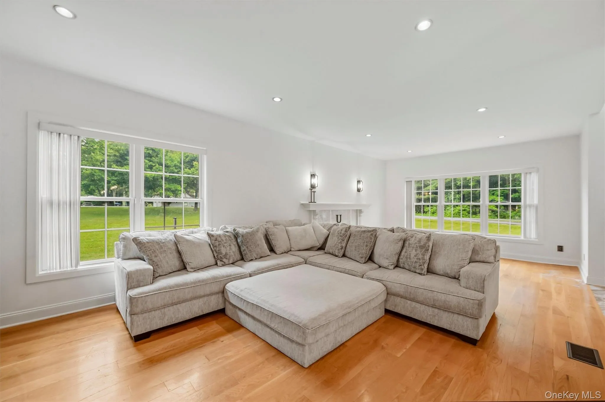 Family room, with Anderson windows, recessed lighting, wide plank white oak flooring and 9 foot ceilings. Family room, with Anderson windows, recessed lighting, wide plank white oak flooring and 9 foot ceilings.