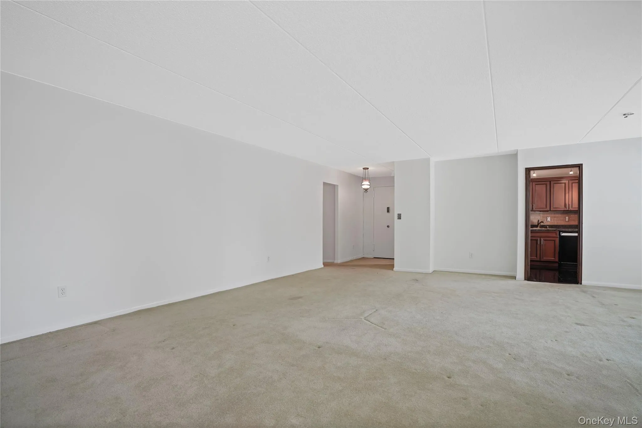 From the living room, looking to the kitchen From the living room, looking to the kitchen