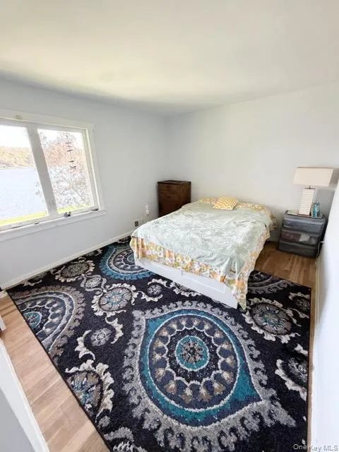 Hardwood-style flooring and light-colored walls Hardwood-style flooring and light-colored walls