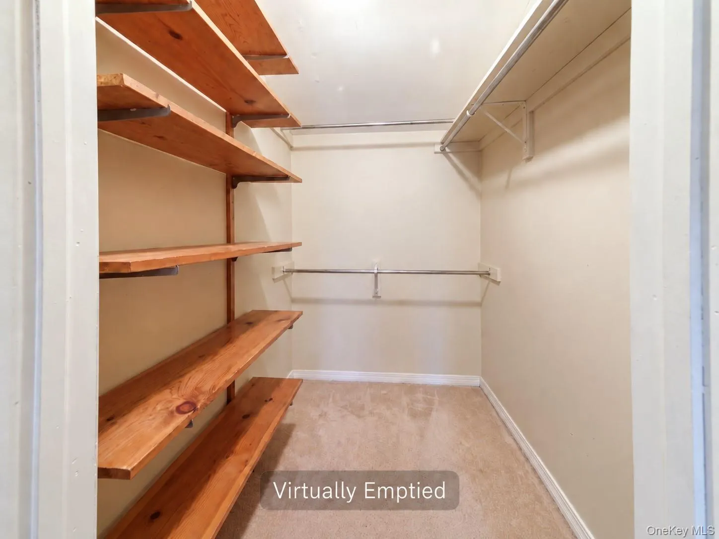 Walk in closet virtually emptied Walk in closet virtually emptied