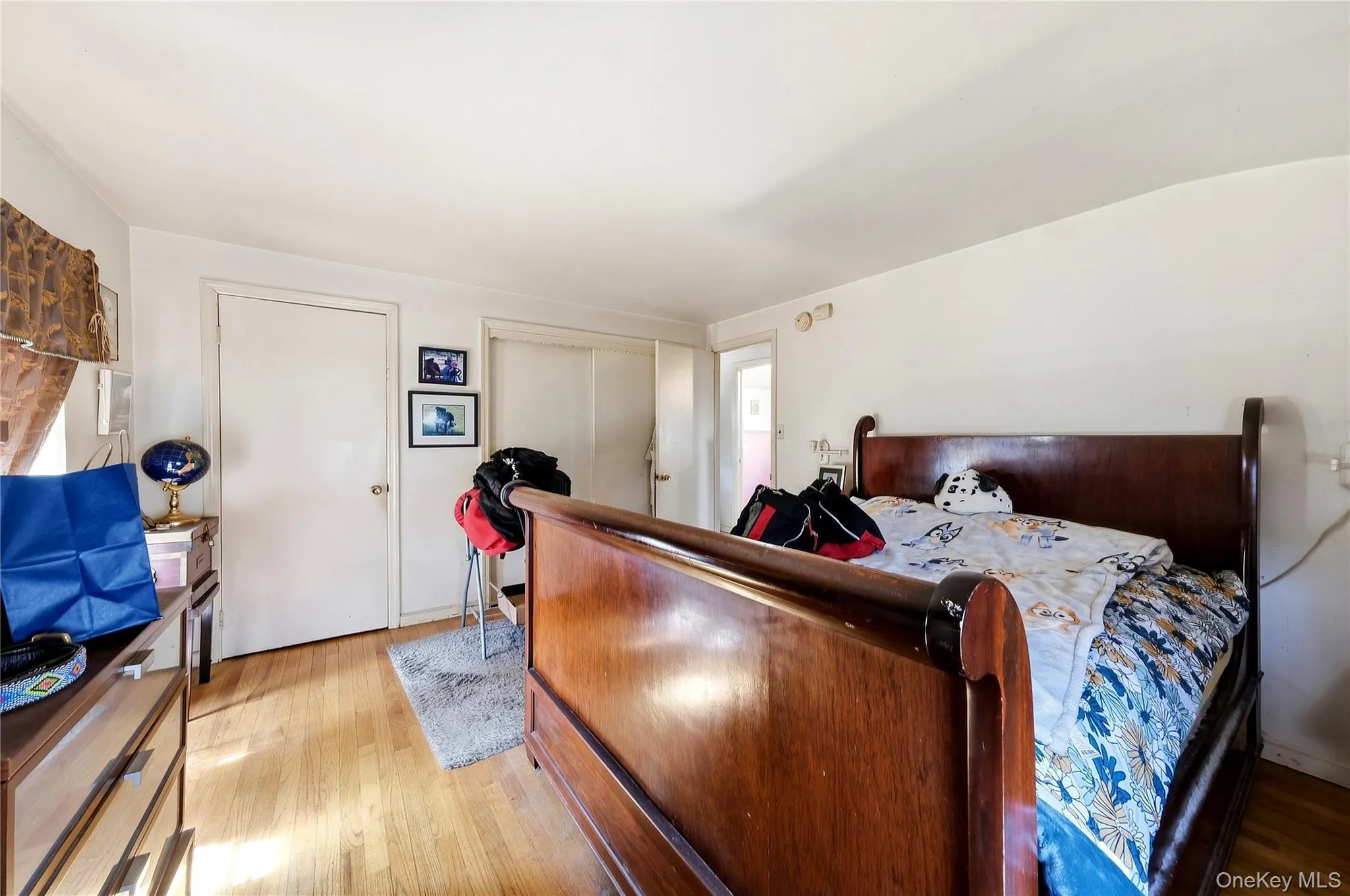 Bedroom with walk in closet and additional closet Bedroom with walk in closet and additional closet