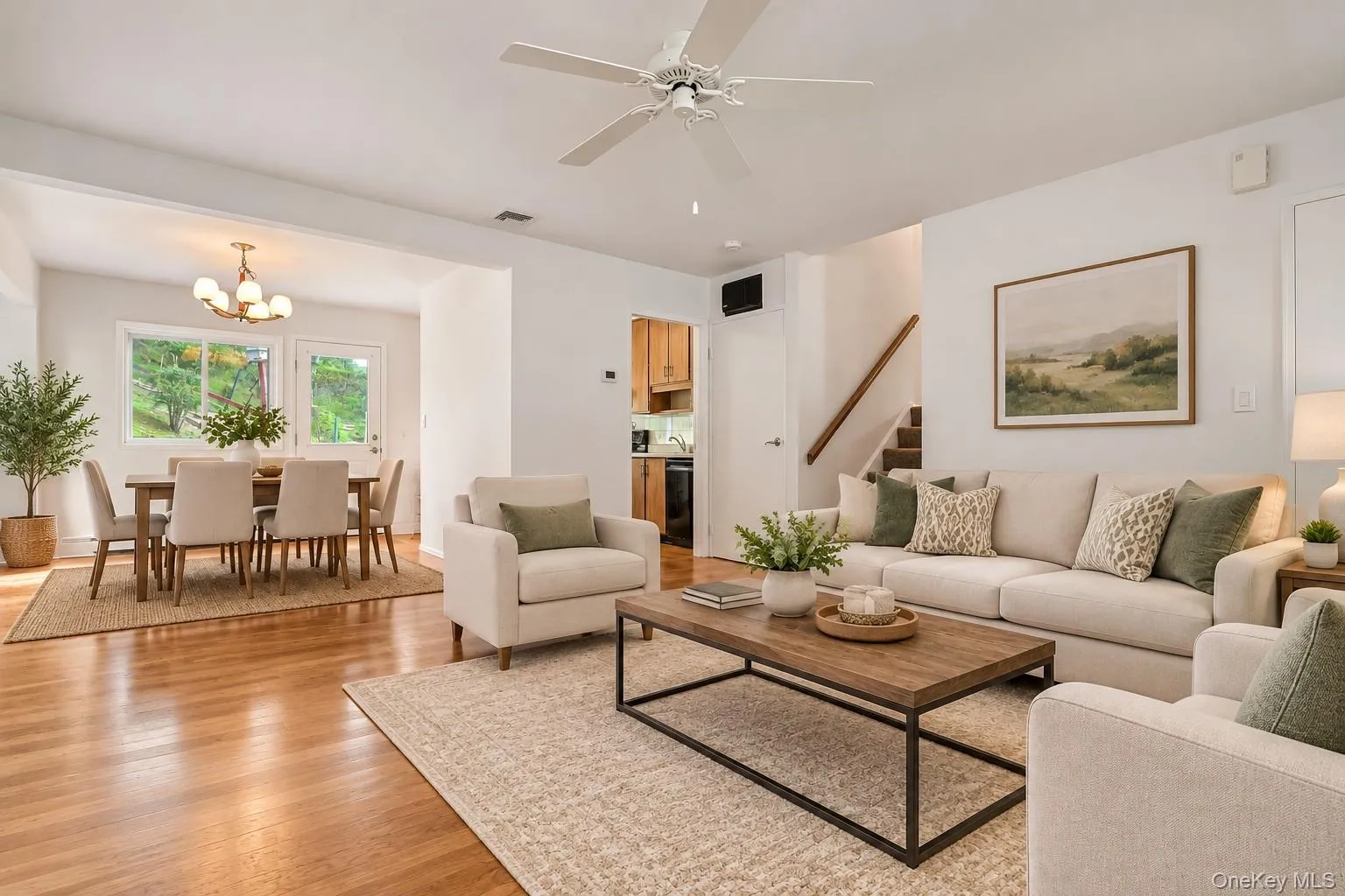 Virtually staged living room and dining room. Virtually staged living room and dining room.