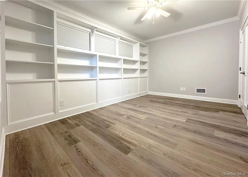 Entry level bedroom/office with closet. Entry level bedroom/office with closet.
