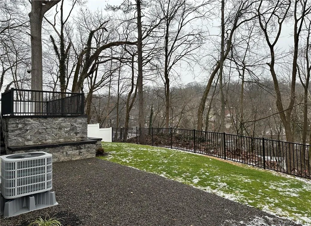 Backyard with access from family room and living space. Backyard with access from family room and living space.