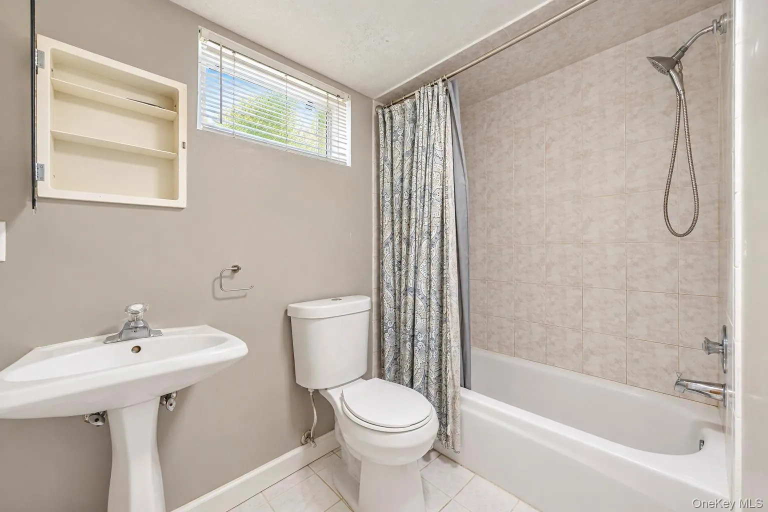 White pedestal sink with chrome faucet White pedestal sink with chrome faucet