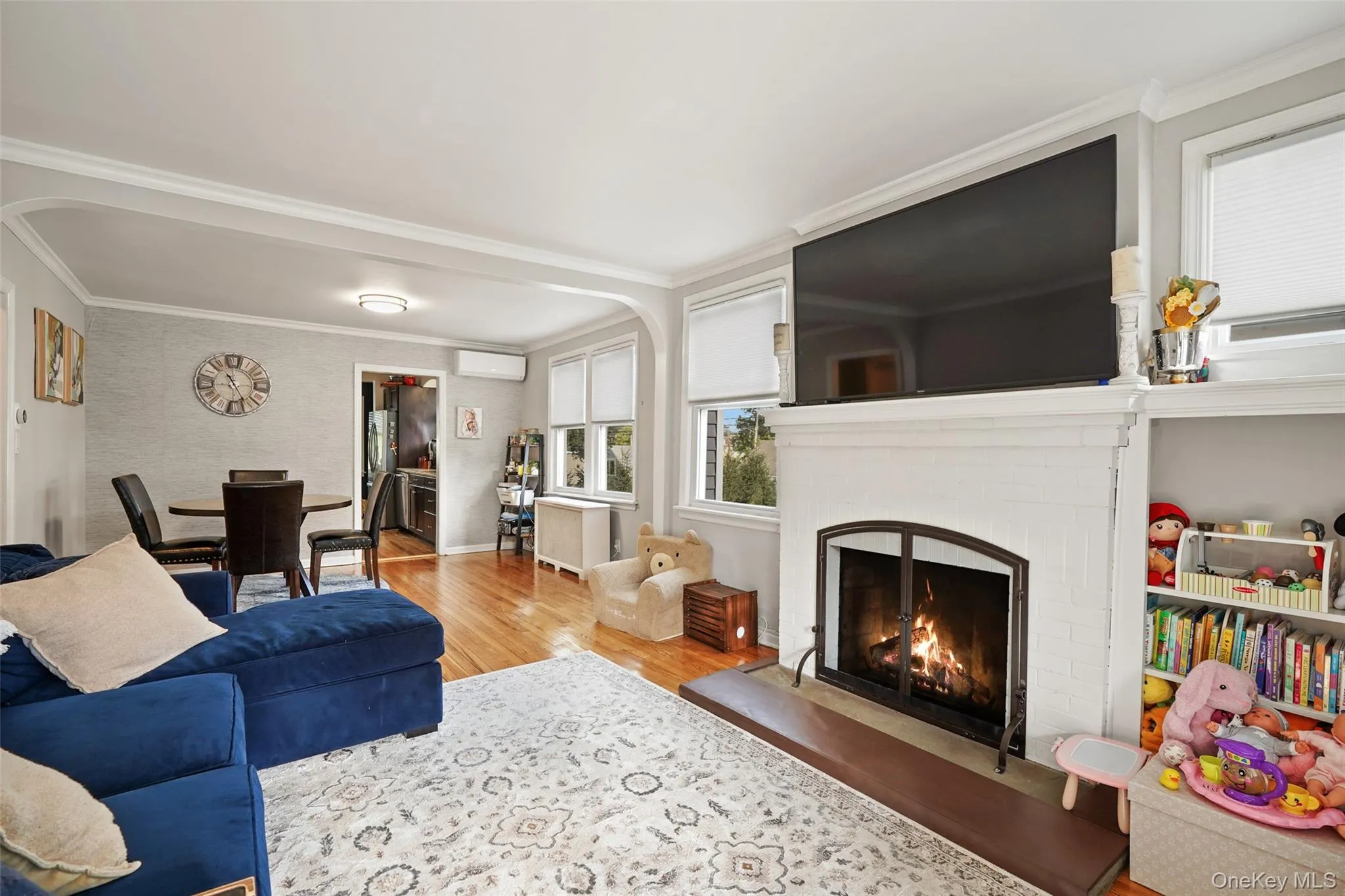 Open family and dining room with wood-burning fireplace Open family and dining room with wood-burning fireplace
