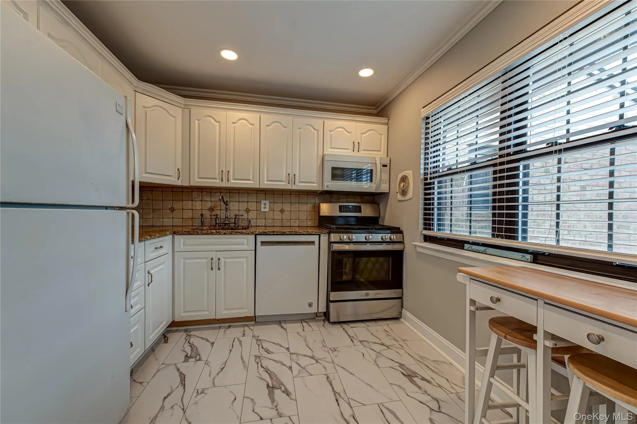 Kitchen with Recessed Lighting and Windows Kitchen with Recessed Lighting and Windows