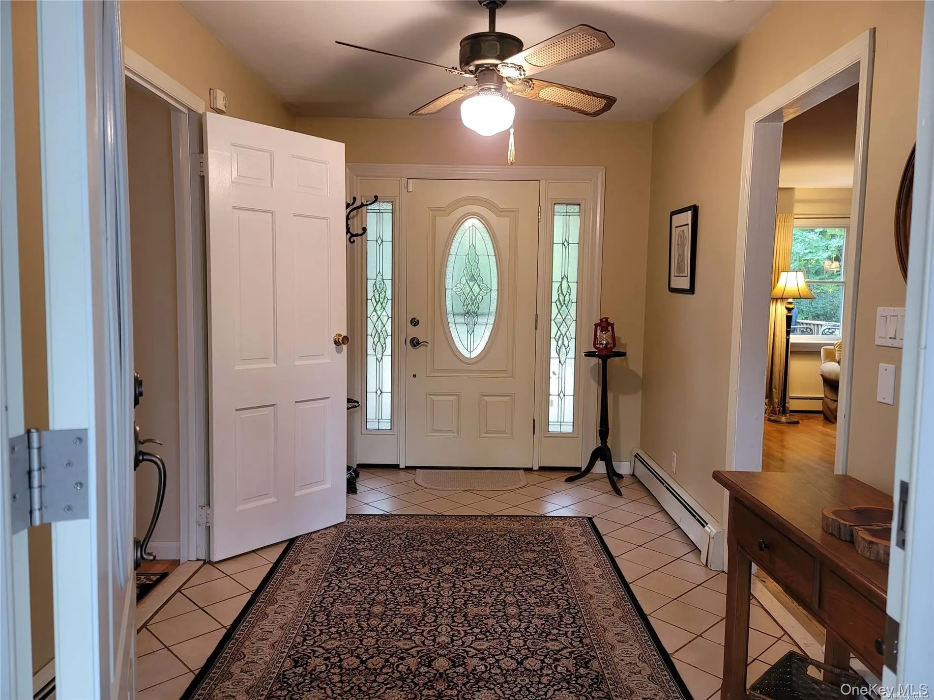 Center hall entry flows to living area and bedrooms with central access to deck and parklike yard Center hall entry flows to living area and bedrooms with central access to deck and parklike yard