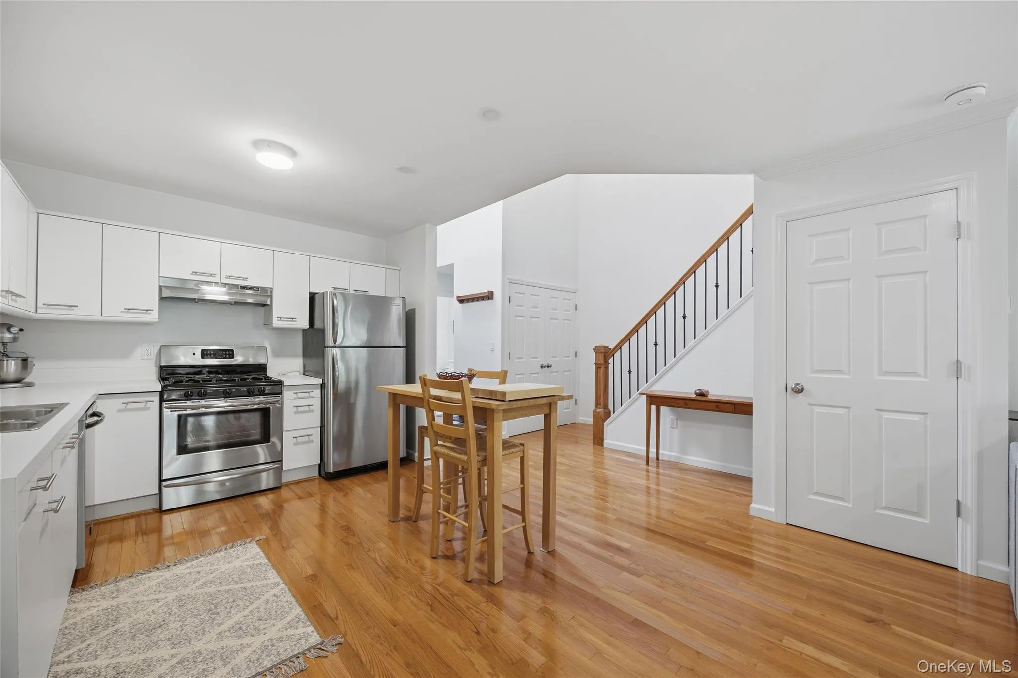 Additional view of updated Kitchen with the door to the Basement. Additional view of updated Kitchen with the door to the Basement.