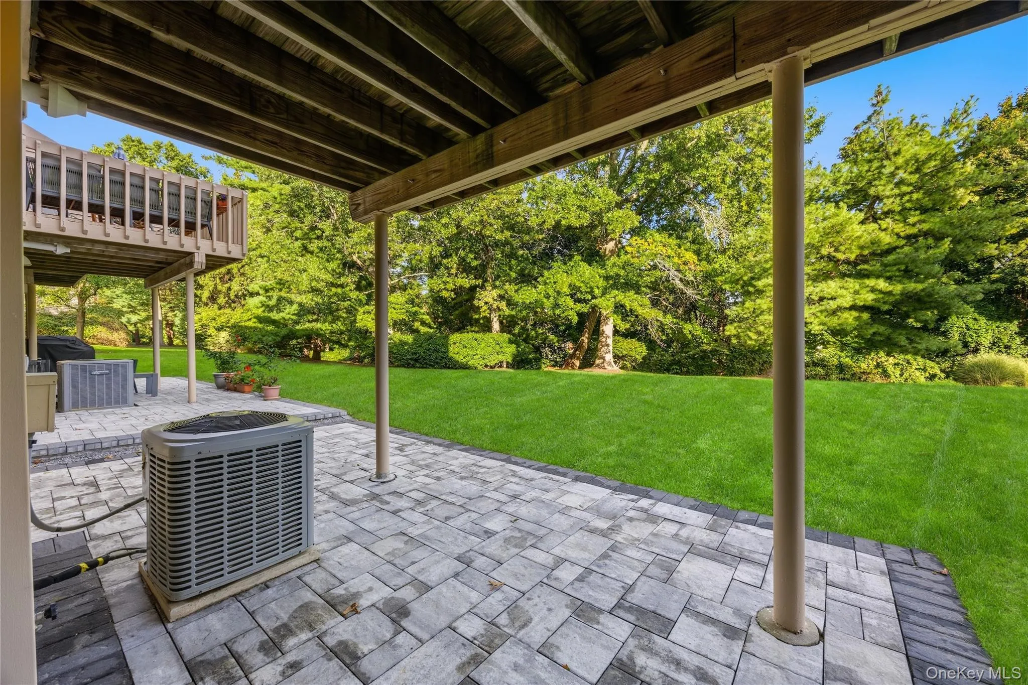 Enjoy sitting on the patio overlooking the yard Enjoy sitting on the patio overlooking the yard