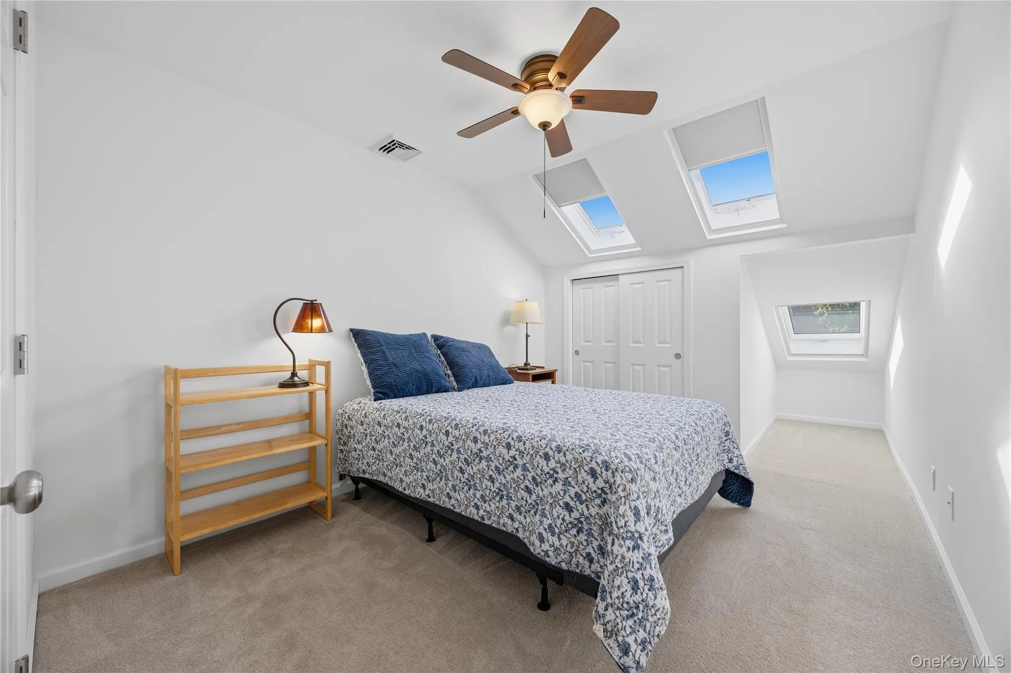 Second Bedroom with ceiling fan, double wide closet & 3 skylights Second Bedroom with ceiling fan, double wide closet & 3 skylights