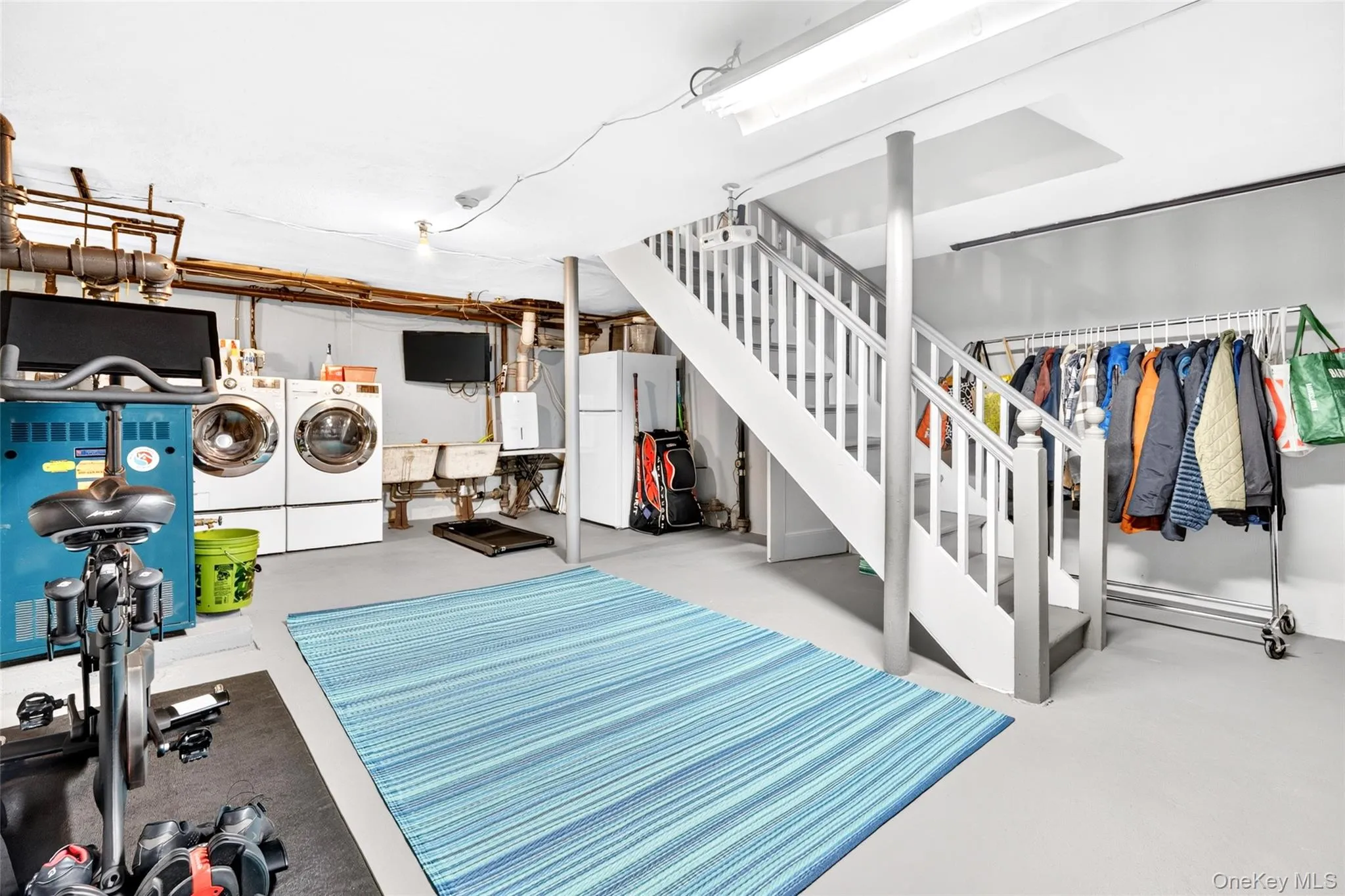Storage, workout area and laundry Storage, workout area and laundry