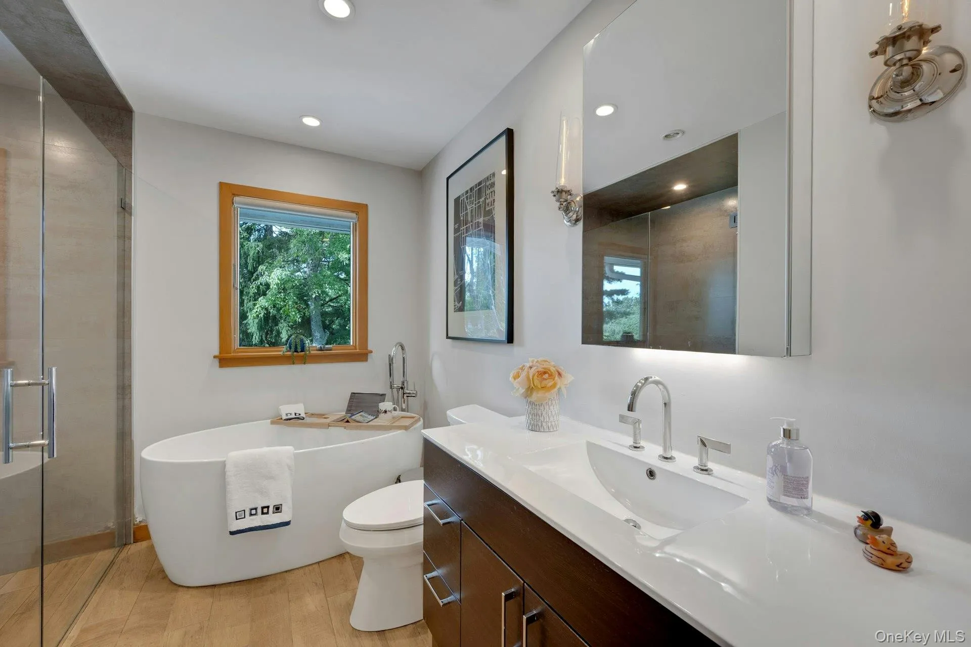 Updated bathroom with no step walk-in shower and soaking tub. Updated bathroom with no step walk-in shower and soaking tub.