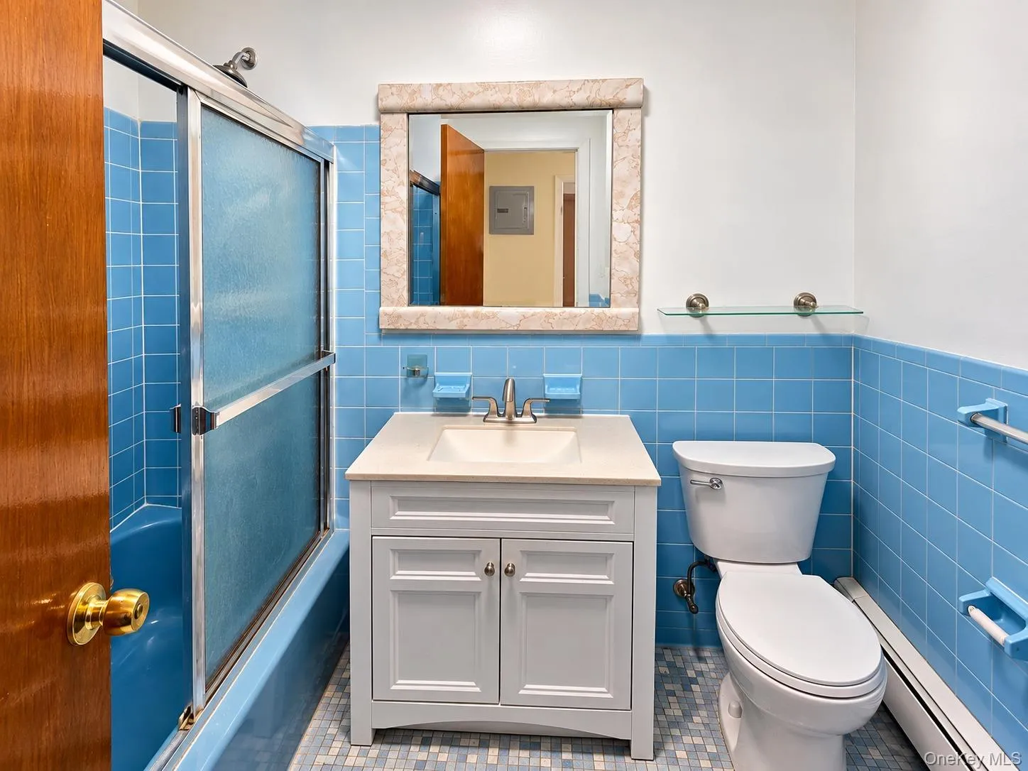 Full bathroom with tub/shower combination featuring charming original details Full bathroom with tub/shower combination featuring charming original details