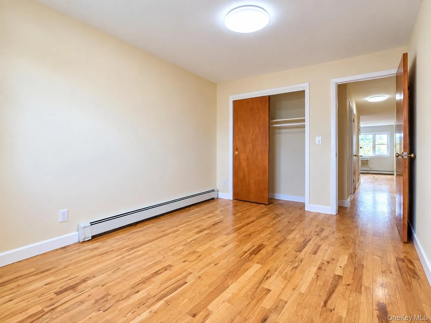 Alternate view of bedroom showcasing its comfortable proportions and functional layout. Alternate view of bedroom showcasing its comfortable proportions and functional layout.