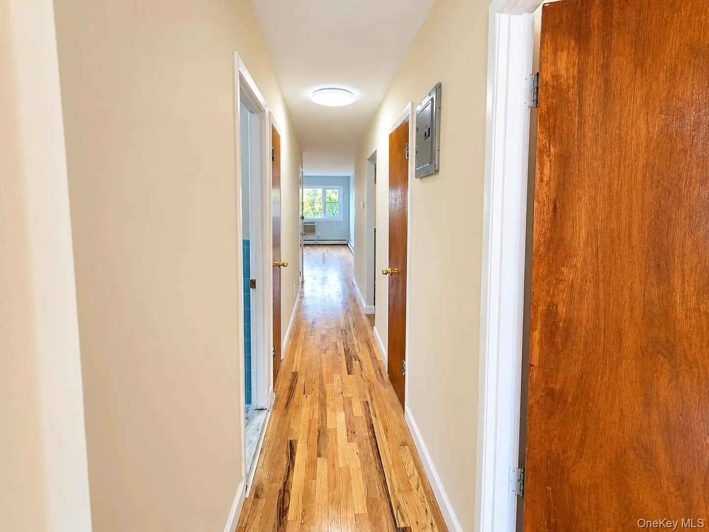 Central hallway connecting the bedrooms, baths, and main living areas. Central hallway connecting the bedrooms, baths, and main living areas.