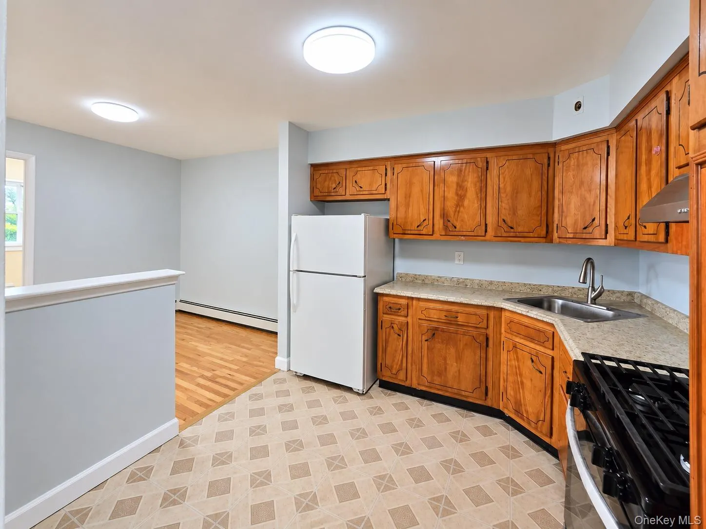 Functional kitchen with generous cabinet storage and workspace. Functional kitchen with generous cabinet storage and workspace.