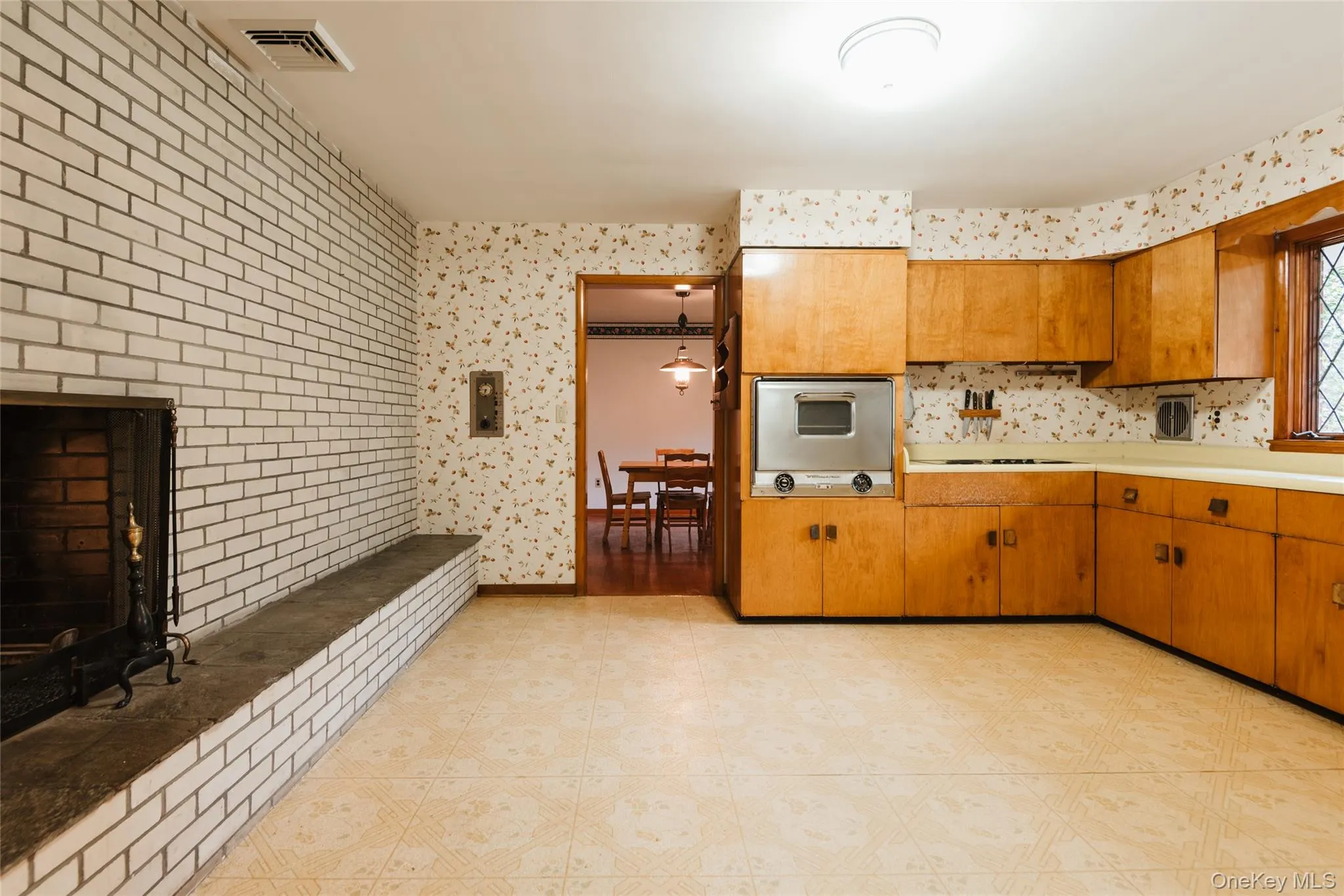 Kitchen with fireplace Kitchen with fireplace
