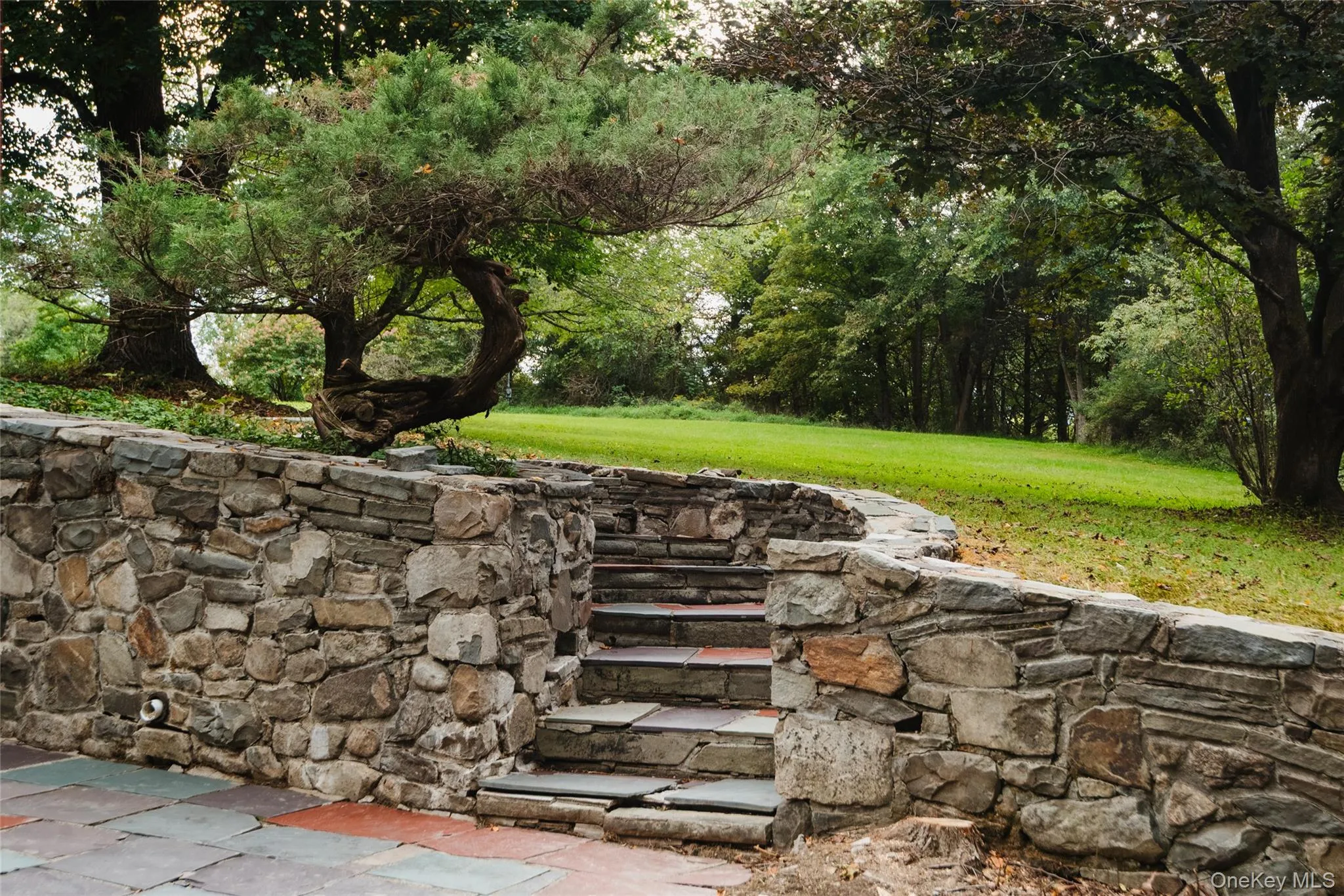 Slate walkway from front door to basement entry Slate walkway from front door to basement entry