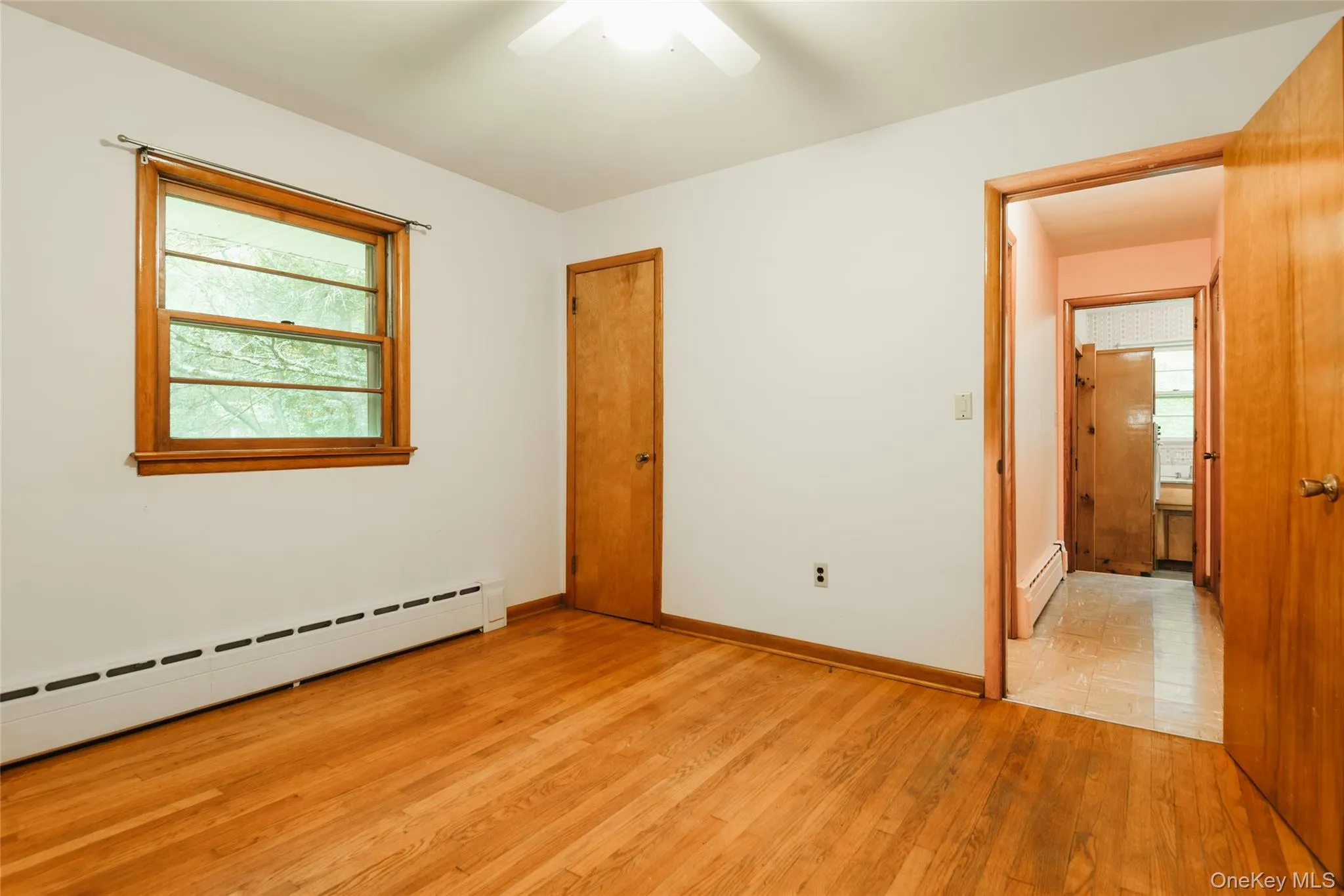 Apartment bedroom, door to main house kitchen behind Apartment bedroom, door to main house kitchen behind