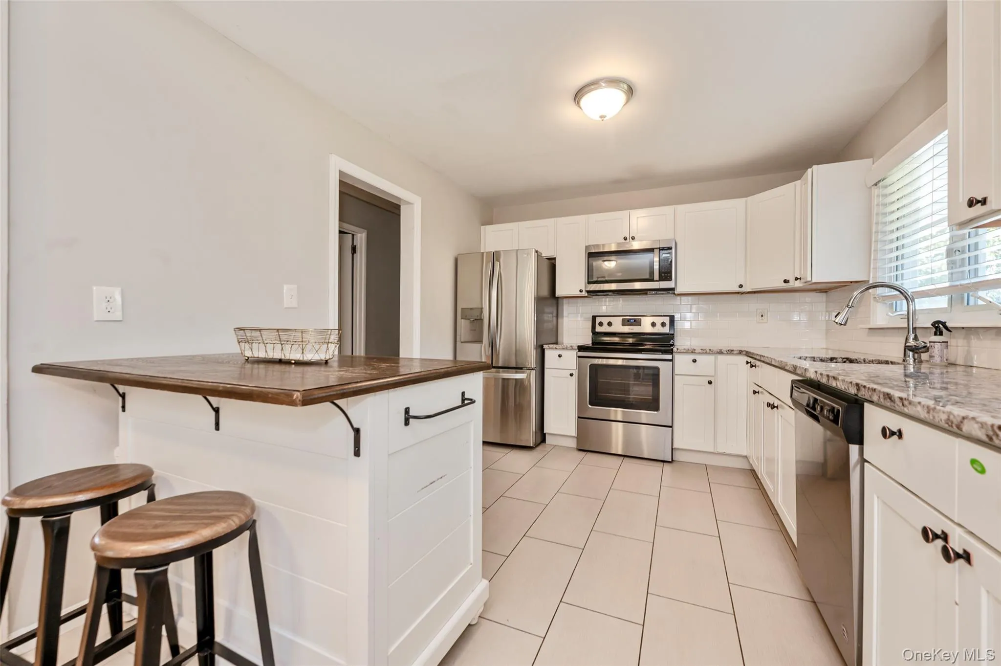 Updated Kitchen with moveable island Updated Kitchen with moveable island