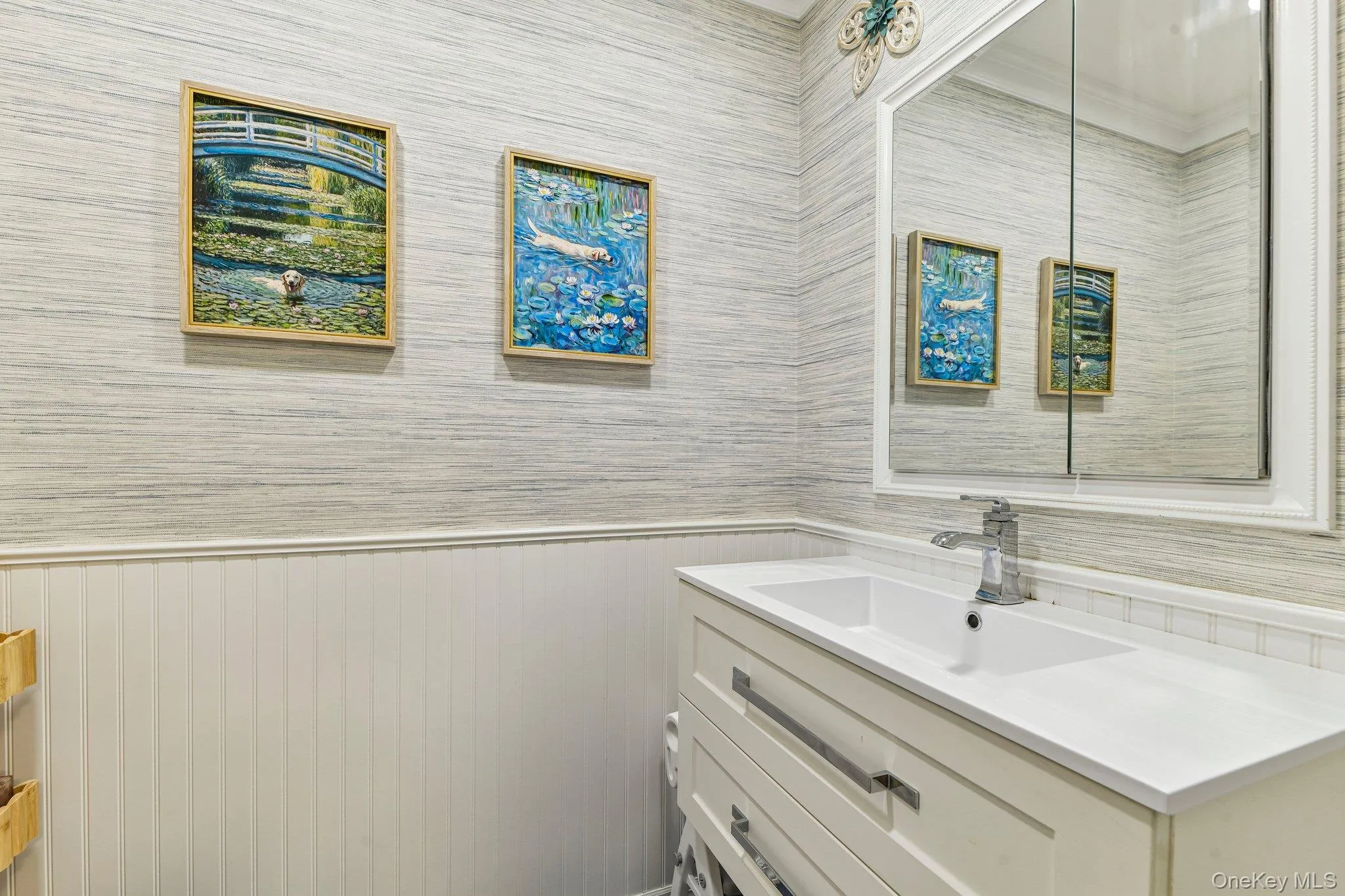 Half Bathroom off entry foyer. Half Bathroom off entry foyer.