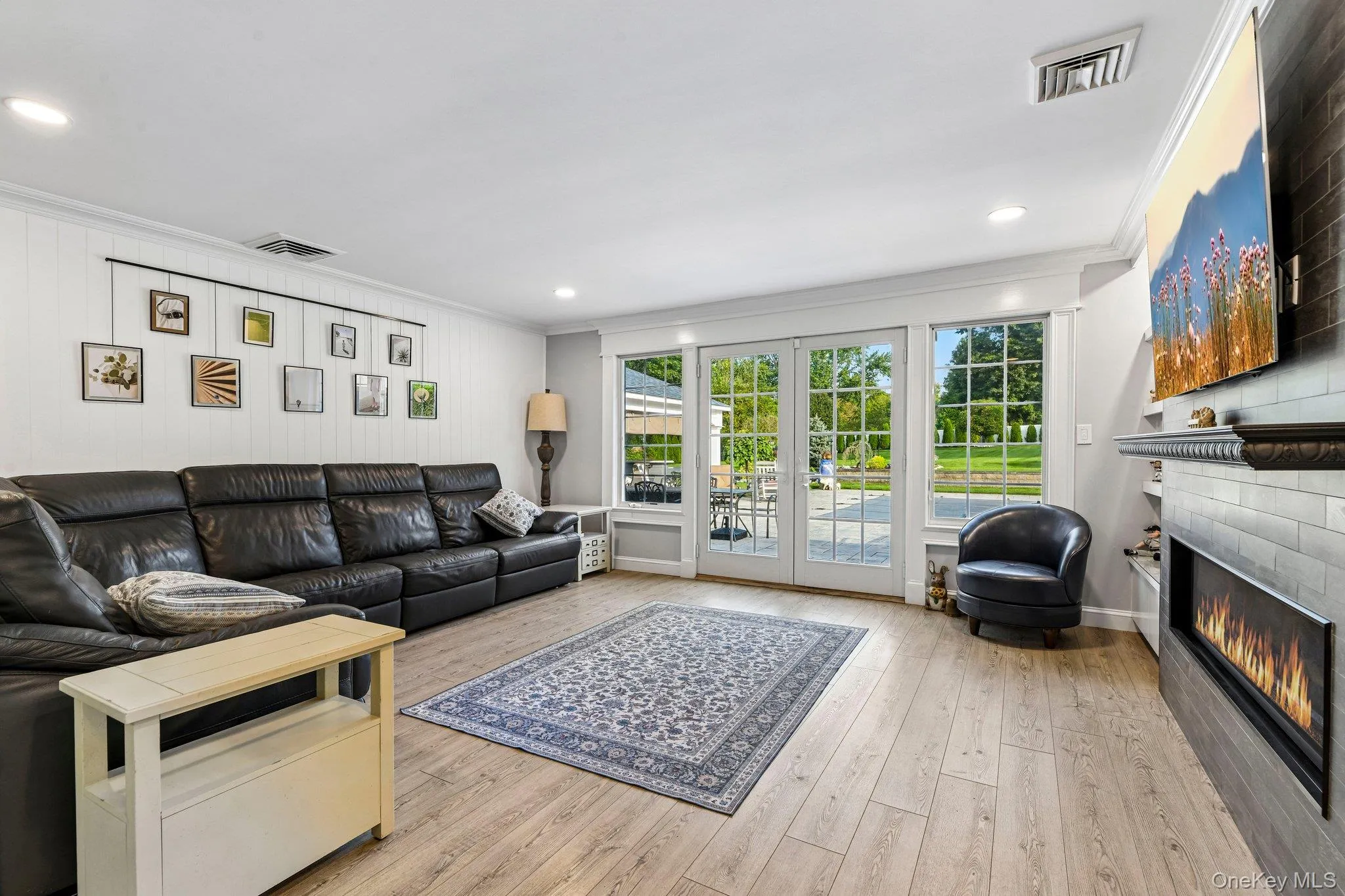 French Doors to Country Club Yard, Electric Fireplace French Doors to Country Club Yard, Electric Fireplace