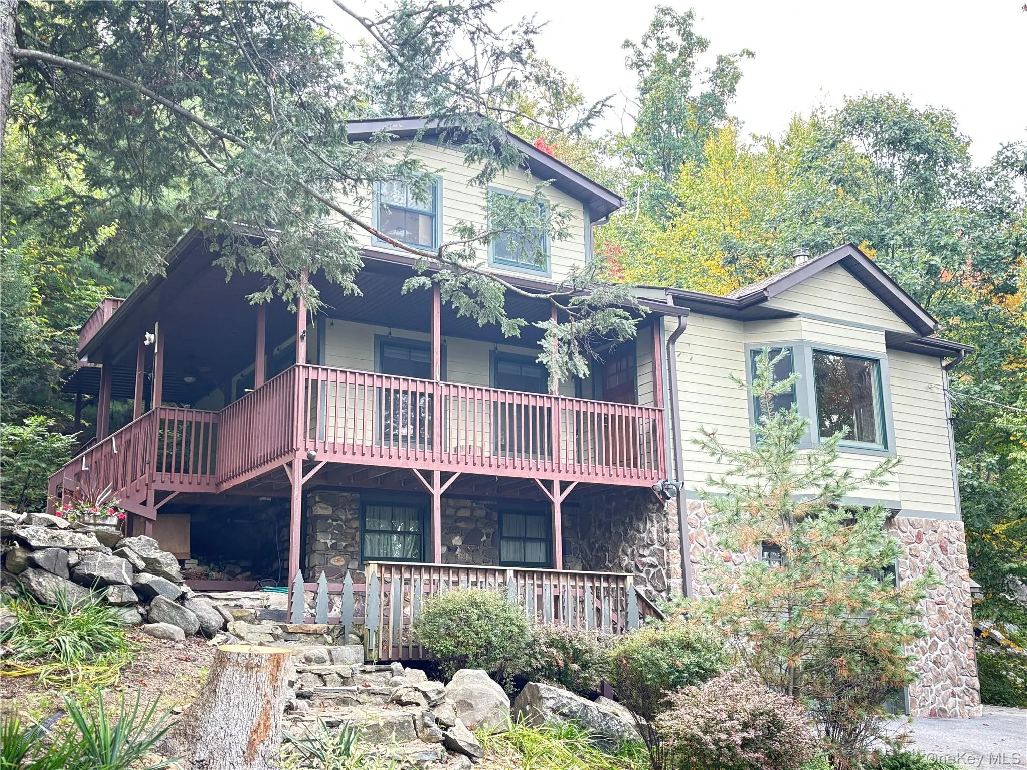 This property has so much to offer. Three levels of living, wraparound deck, indoor, and outdoor space for enjoyment. This property has so much to offer. Three levels of living, wraparound deck, indoor, and outdoor space for enjoyment.