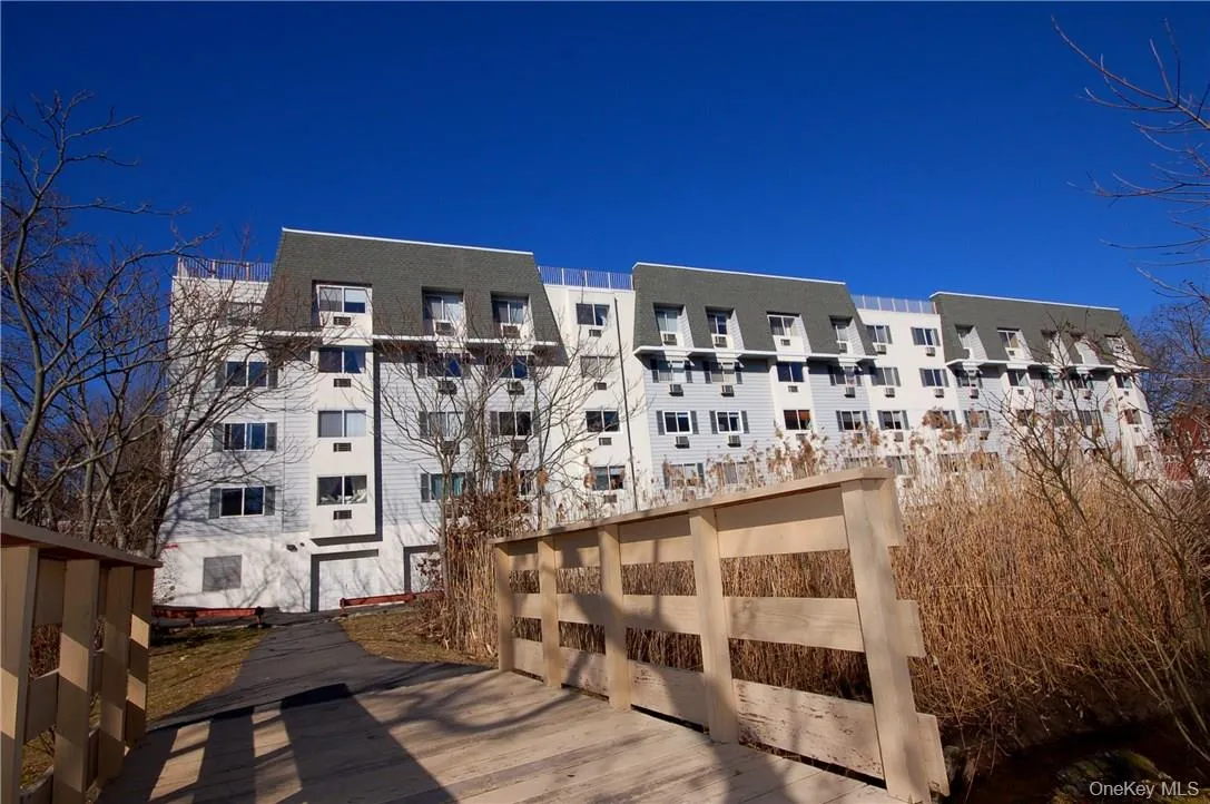 Rear of the complex from bridge to Shore Acres Drive Rear of the complex from bridge to Shore Acres Drive