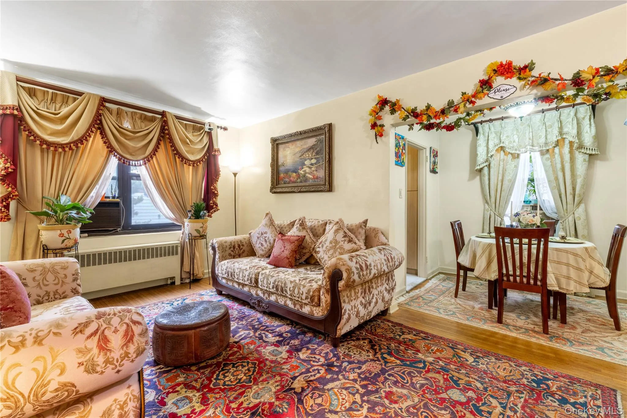 Hardwood flooring, painted walls, and window treatments throughout Hardwood flooring, painted walls, and window treatments throughout