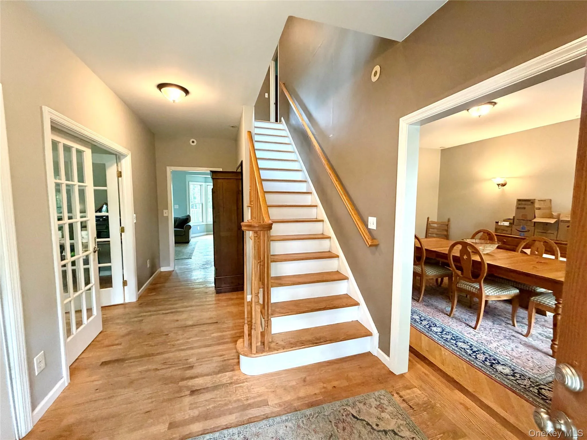Lovely entry with French doors to the left leading to the office, den, playroom etc. and to the right to the lovely formal dining room. Lovely entry with French doors to the left leading to the office, den, playroom etc. and to the right to the lovely formal dining room.