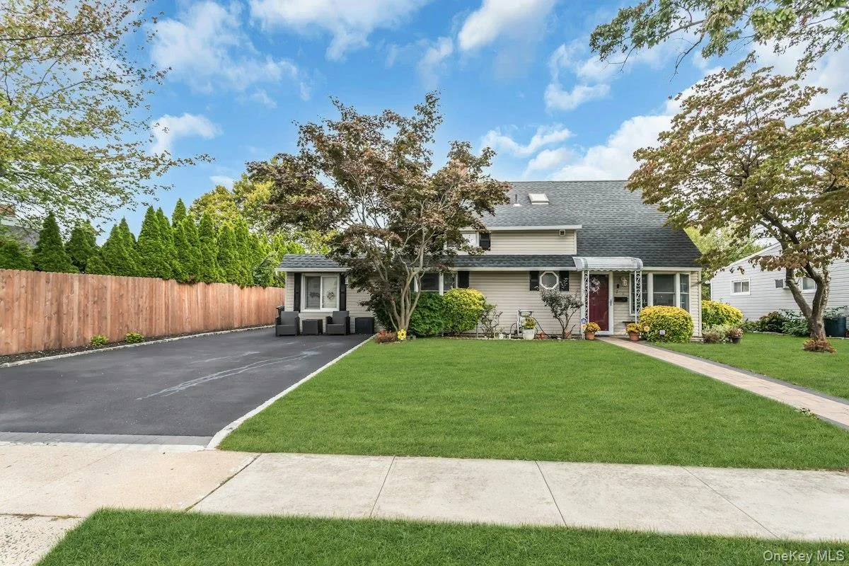 Double Wide Asphalt Driveway with Cobblestone Border Double Wide Asphalt Driveway with Cobblestone Border