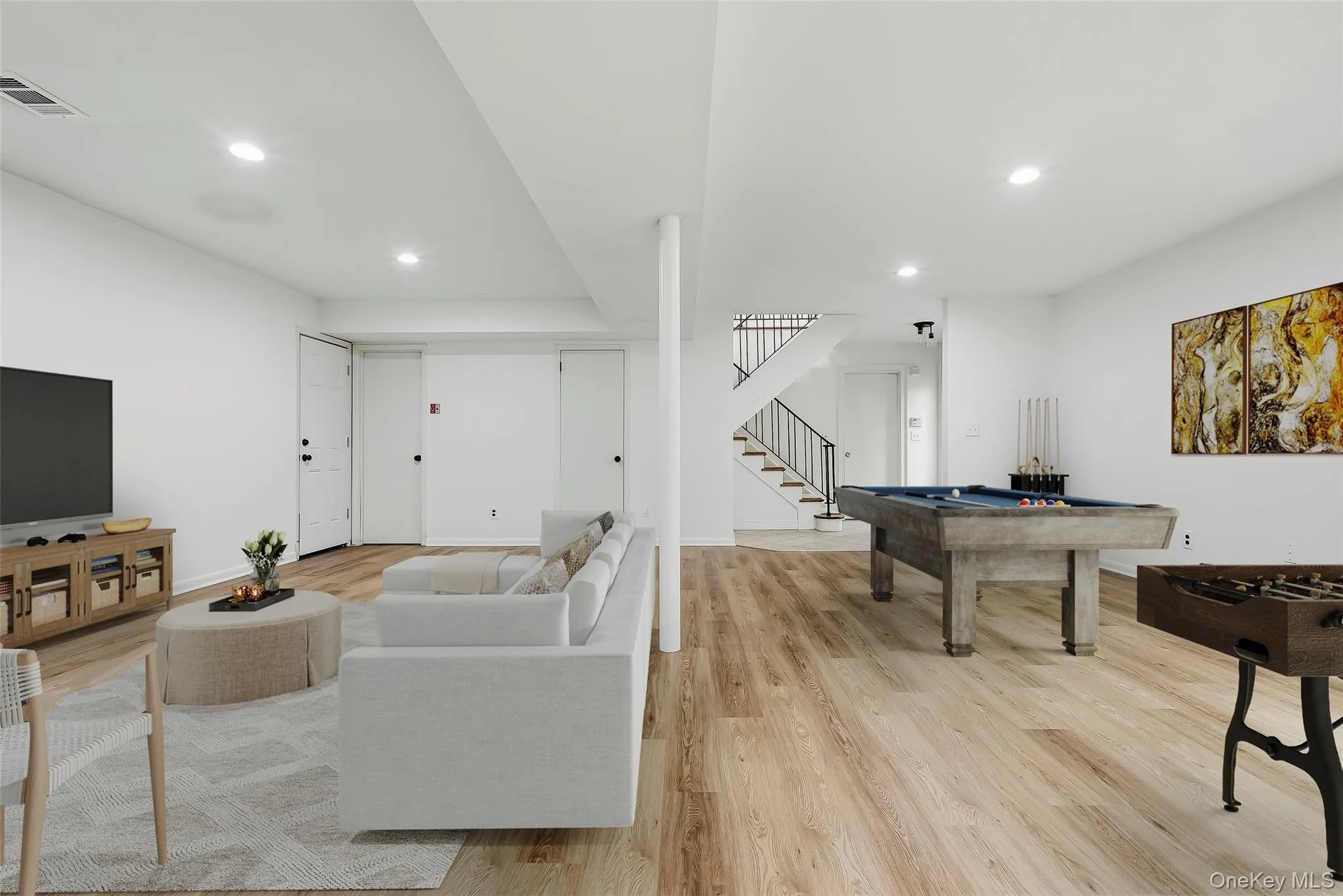 Virtually staged lower level with brand new floors & fresh paint. Virtually staged lower level with brand new floors & fresh paint.
