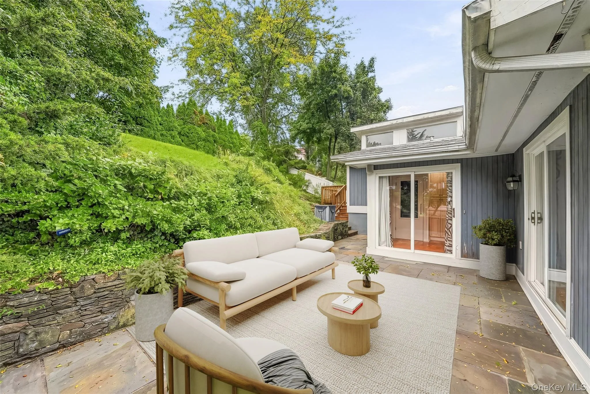 Virtually staged blue stone patio. Virtually staged blue stone patio.