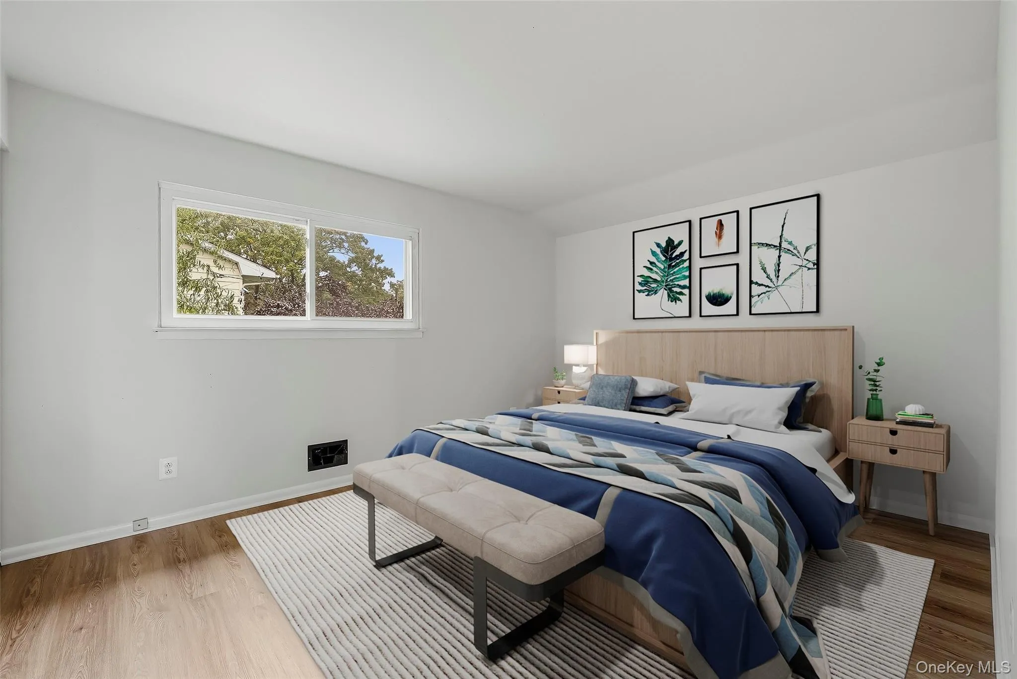 Virtually staged 2nd bedroom with brand new floors. Virtually staged 2nd bedroom with brand new floors.