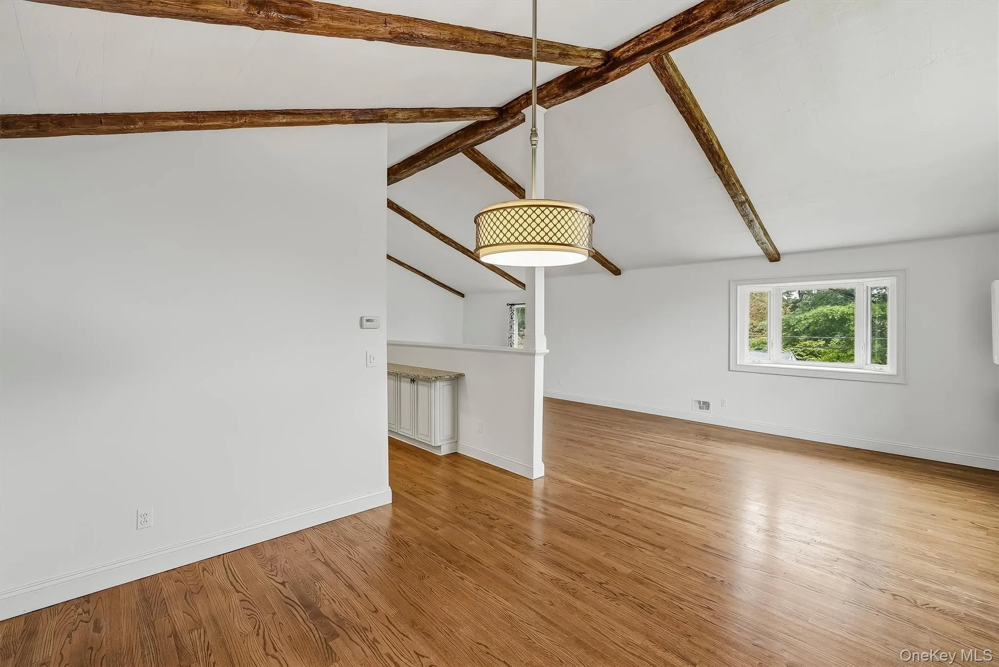 Dining area w/ hardwood floors and fresh paint. Dining area w/ hardwood floors and fresh paint.