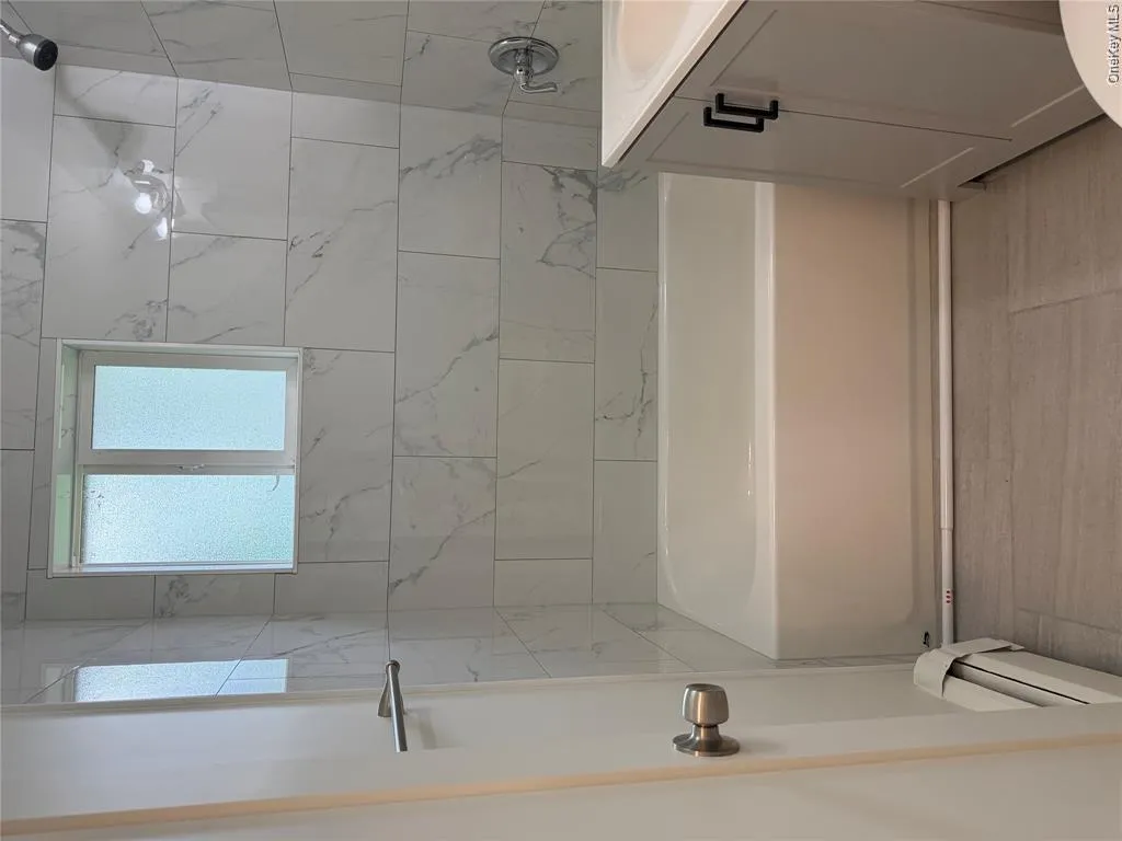 Updated sink and toilet . Updated sink and toilet .