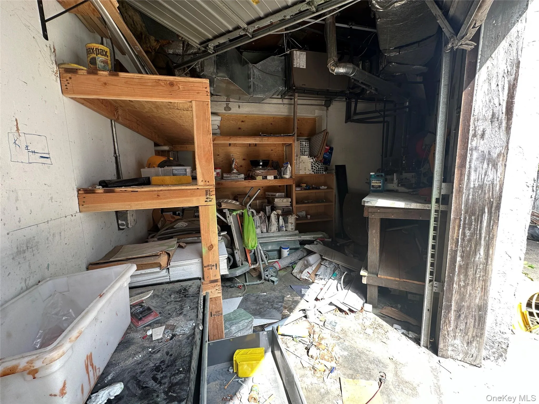 Storage Room with Access Overhead Door to Alley Storage Room with Access Overhead Door to Alley