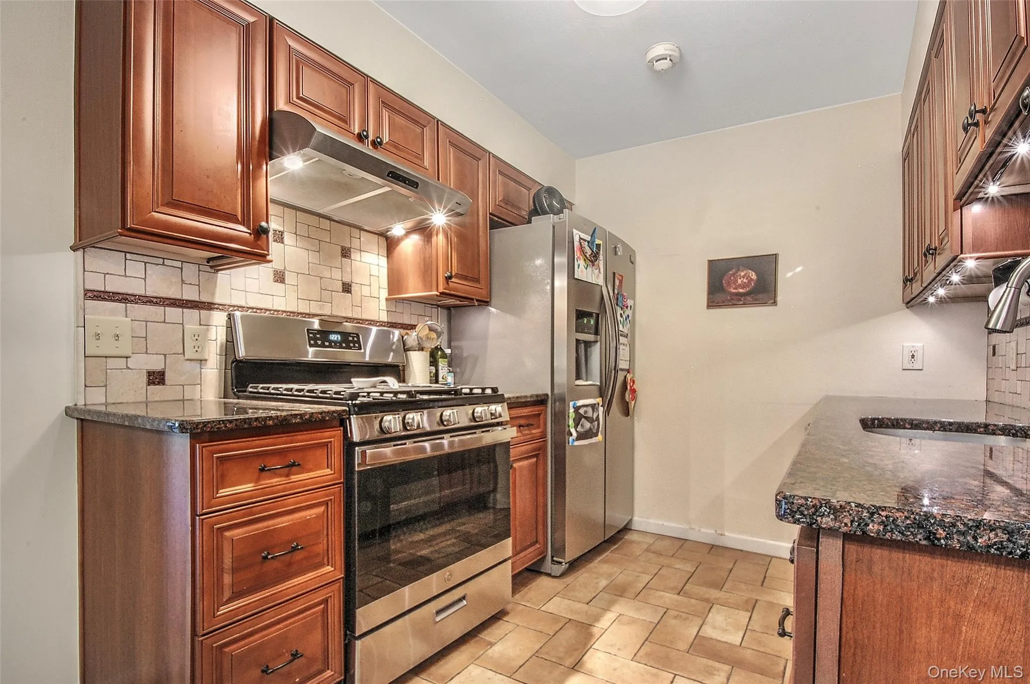 Granite counter-top & stainless-steel appliances Granite counter-top & stainless-steel appliances