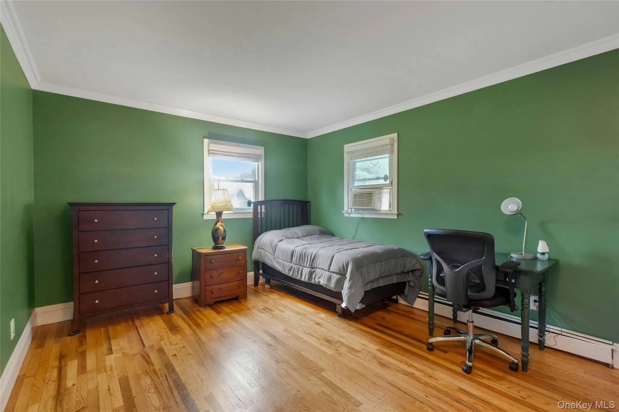 Hardwood flooring throughout, with two windows providing natural illumination Hardwood flooring throughout, with two windows providing natural illumination