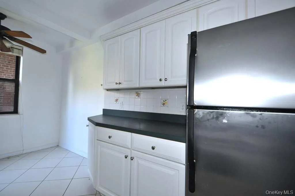 Eat-in-kitchen has stainless steel appliances . Eat-in-kitchen has stainless steel appliances .