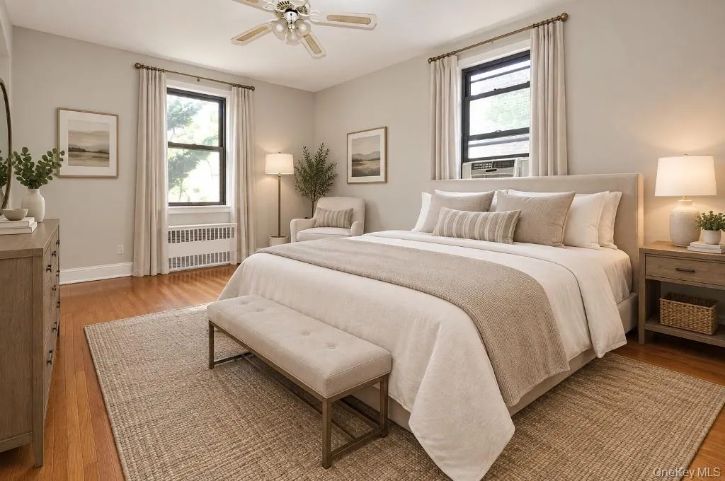 Photo visually staged Large corner bedroom has two closest and hardwood floors. The bedroom is 15'-4" x 11'-4". Photo visually staged Large corner bedroom has two closest and hardwood floors. The bedroom is 15'-4" x 11'-4".