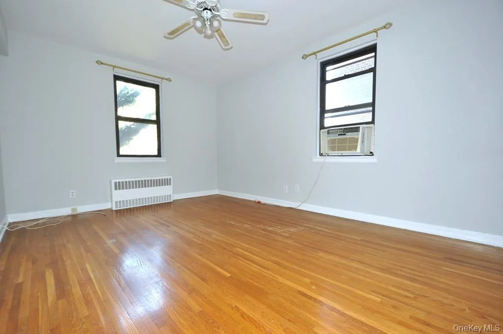 Large corner bedroom has two closest and hardwood floors. The bedroom is 15'-4" x 11'-4". Large corner bedroom has two closest and hardwood floors. The bedroom is 15'-4" x 11'-4".