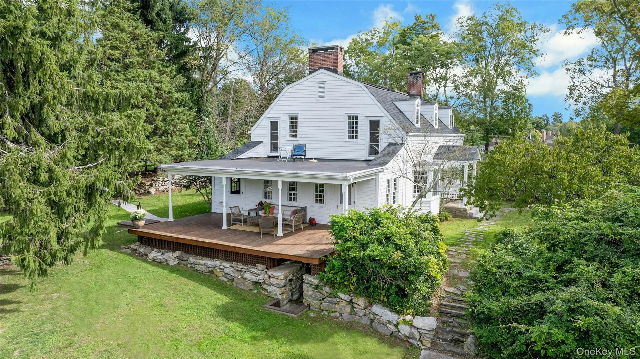 Sited on a quiet country road w/ high ceilings and graciously sized rooms - all overlooking the exceptional property. Sited on a quiet country road w/ high ceilings and graciously sized rooms - all overlooking the exceptional property.